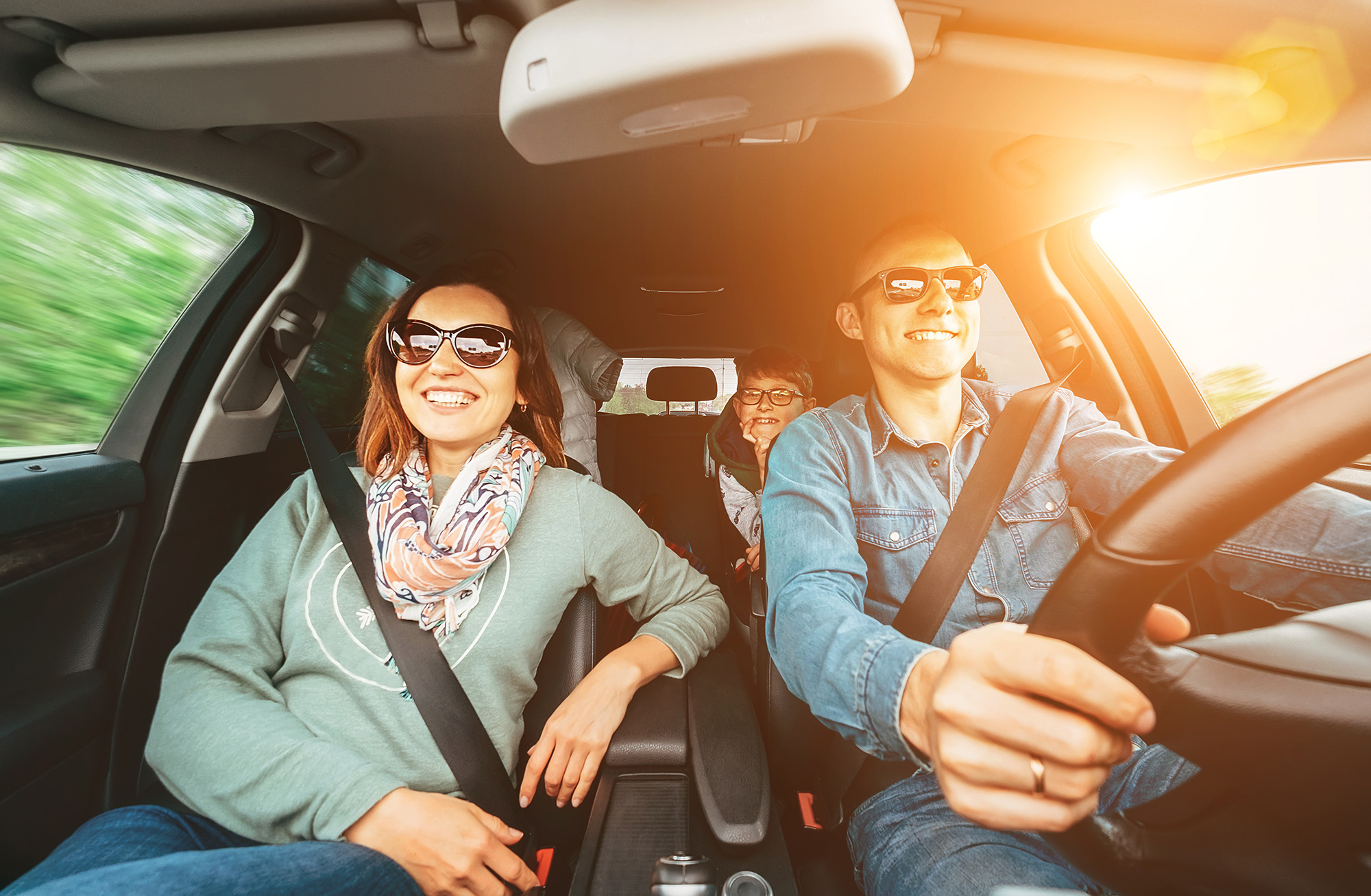 a family driving in a car